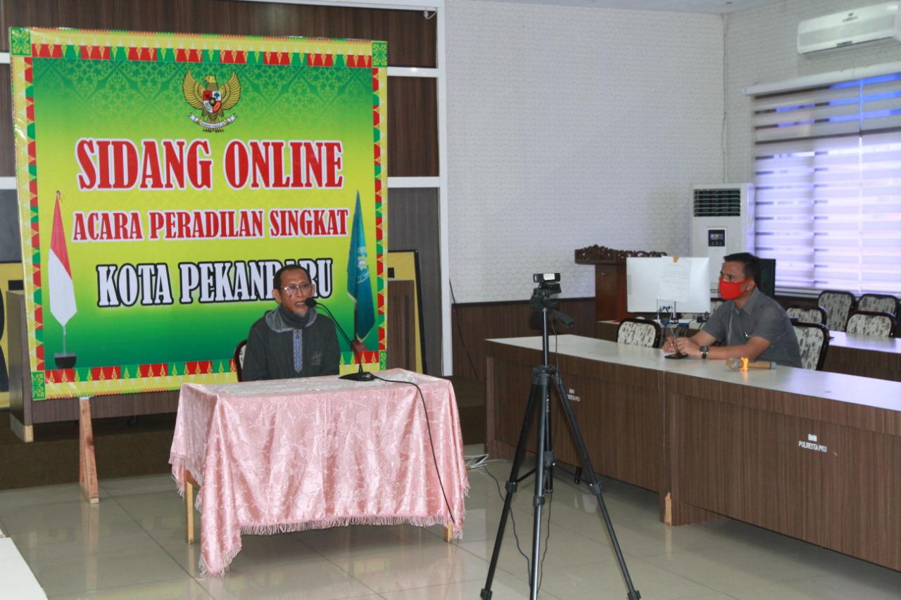 Perdana, Pelanggar PSBB Kota Pekanbaru Disidang Secara Online.