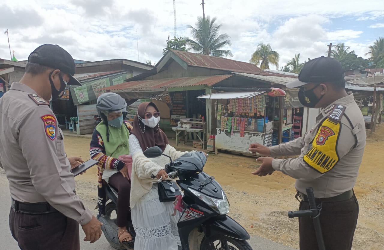 Polsek Kerumutan Ingatkan Warga Terapkan Prokes