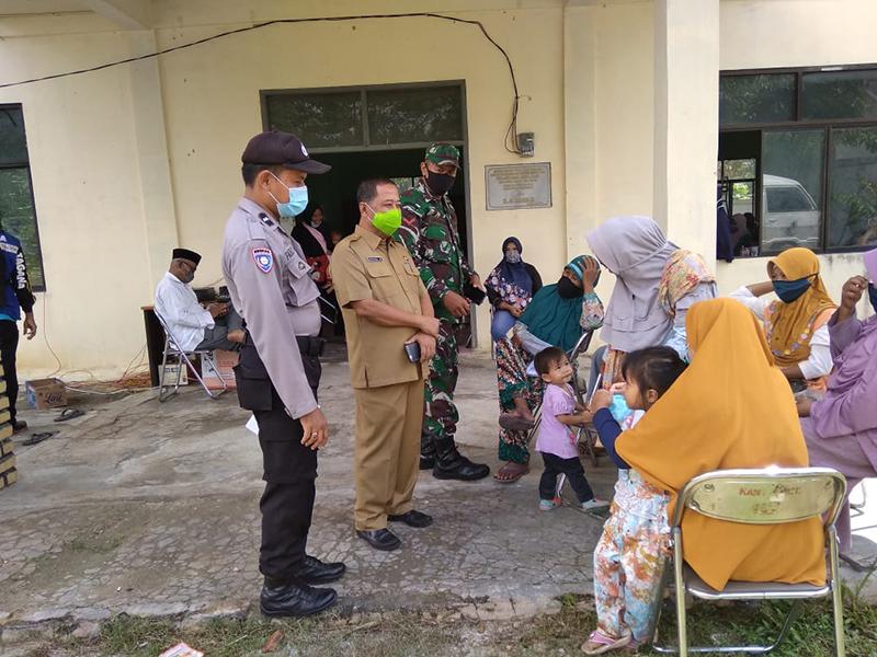 Personel Polsek Bandar Sei Kijang Fokus Sosialisasi Pencegahan Covid-19