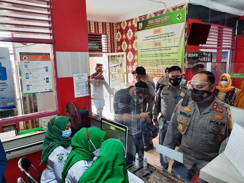 Polsek Pangkalan Kerinci Ikuti Pelaksanaan Vaksinasi Covid-19 di Wilayah Kabupaten Pelalawan