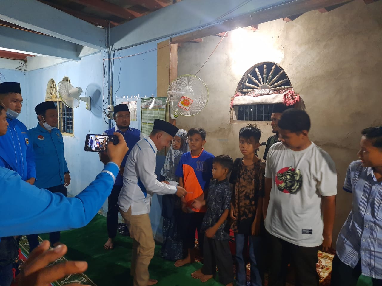 KNPI Provinsi Riau Bersama KNPI Kabupaten Kampar Berikan Bantuan Sajadah, Al Quran Dan Santunan Anak Yatim. 