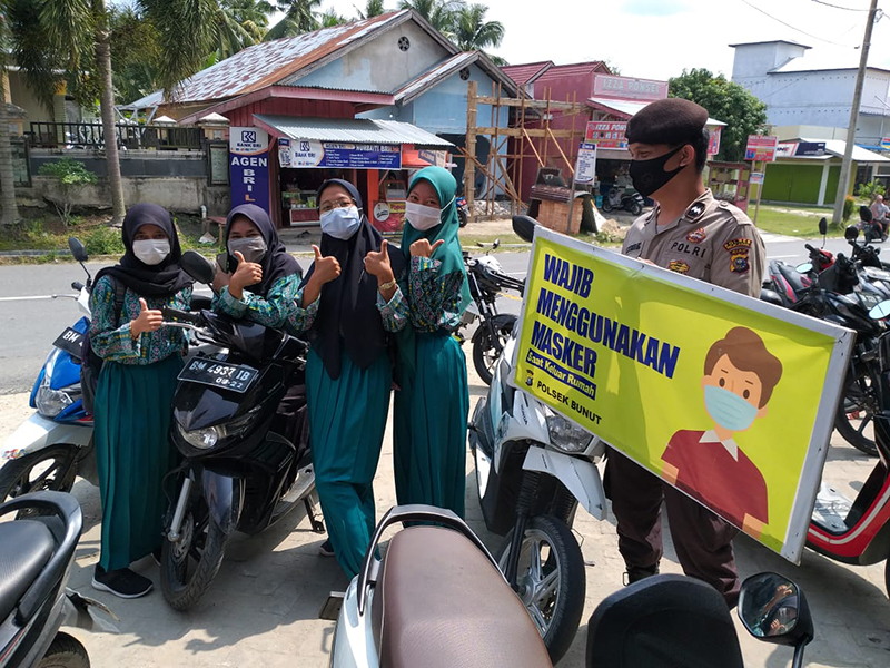Personel Polsek Bunut Lakukan Patroli C3 dan Sosialisasi Prokes