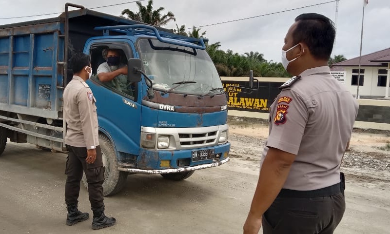 Lindungi Warga Dari Covid-19, Polsubsektor Pelalawan Gencar Gelar Operasi Yustisi