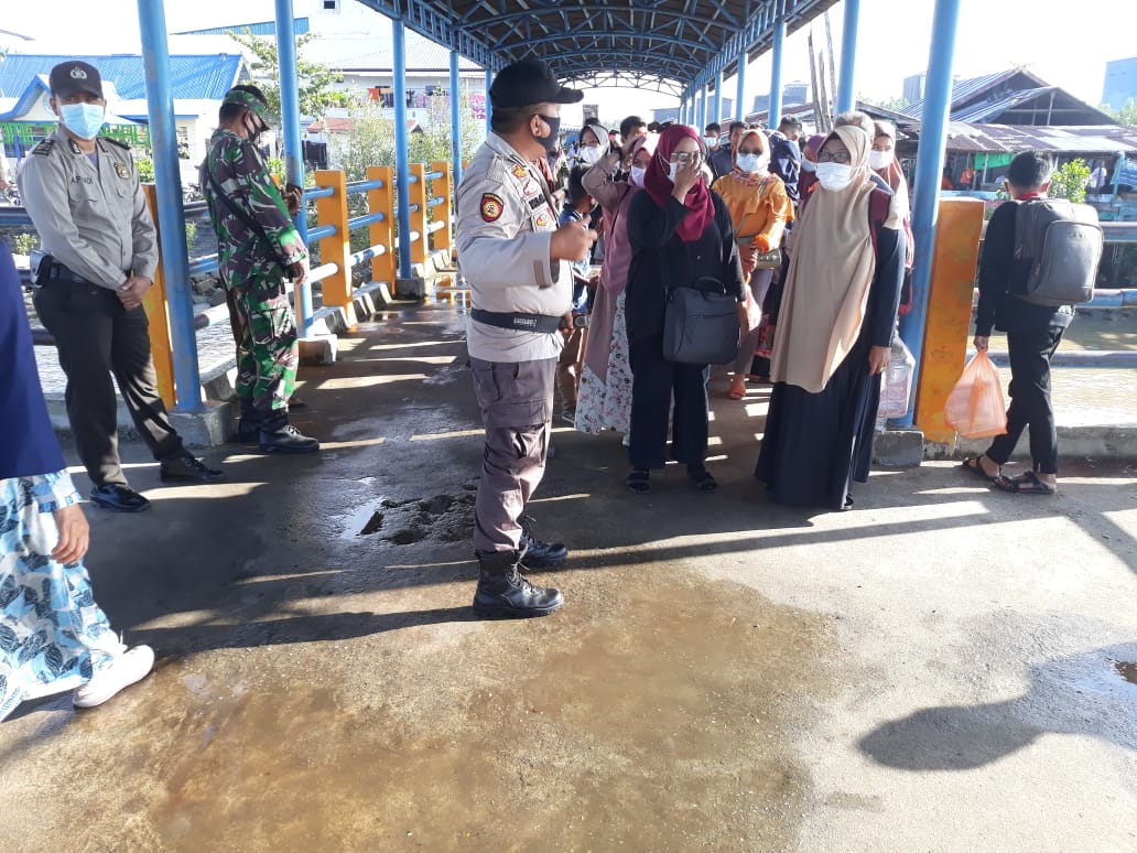 Polsek Kuala Kampar Pantau Penerapan Prokes Warga di Wilayah Pelabuhan