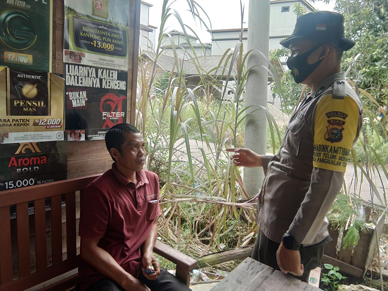 2021 Covid-19 Belum Berakhir, Bhabinkamtibmas Polsek Teluk Meranti Sosialisasikan AKB