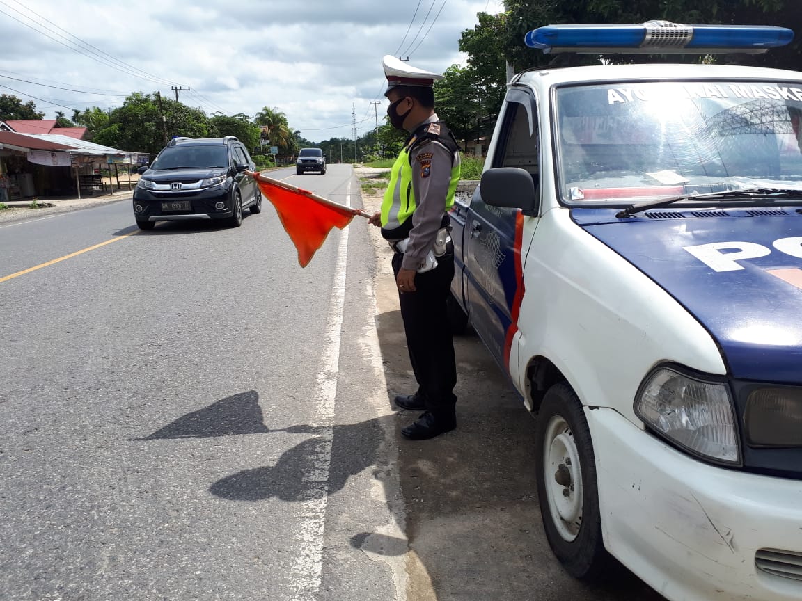 Polsek Pangkalan Kuras Gelar Pengaturan Lalin di Wilayah Sorek Satu