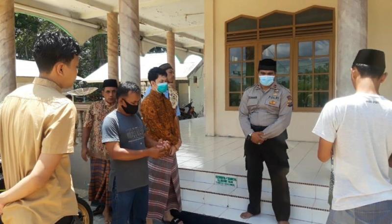 Kapolsubsektor Pelalawan Sosialisasikan Protokol Kesehatan di Masjid Al Mujahiddin Desa Delik