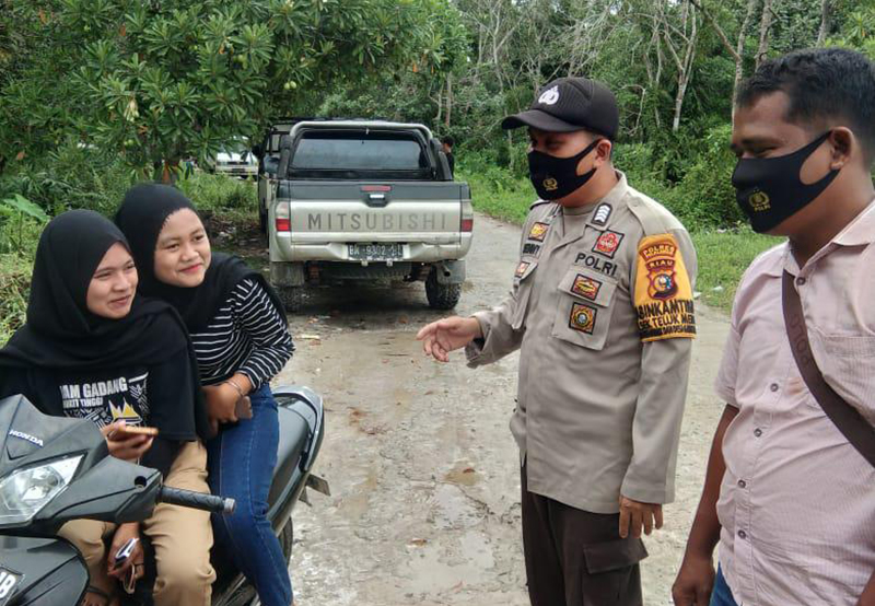 Tingkatkan Kedisiplinan Masyarakat di Akhir Tahun, Polsek Teluk Meranti Imbau Warga Patuhi Prokes 
