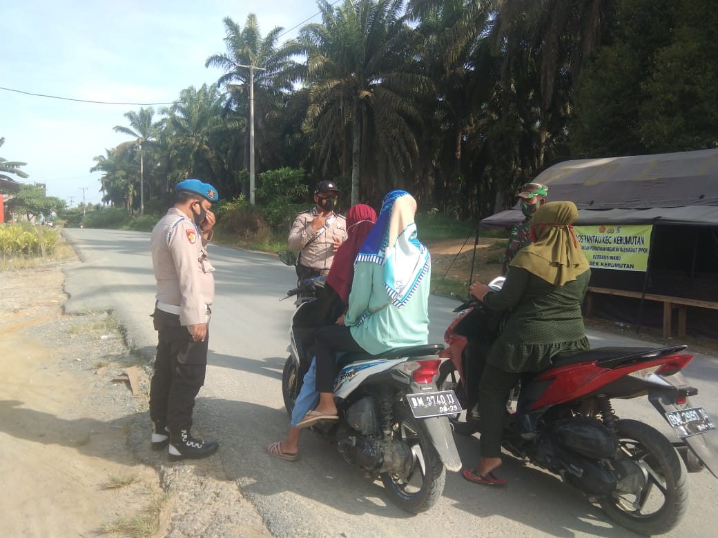 Polsek Kerumutan Minta Warga Terapkan Prokes