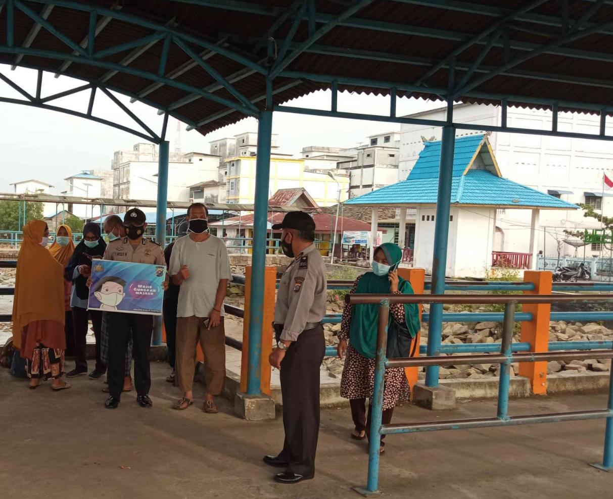 Bersama Tim Satgas Covid-19, Polsek Kuala Kampar Monitor Prokes di Pelabuhan