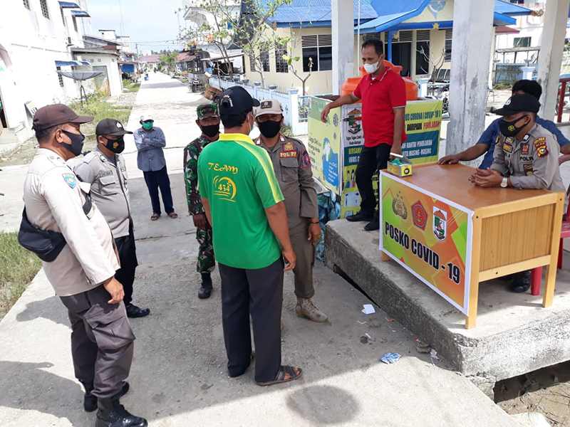 Polsek Kuala Kampar Bentuk Posko Covid-19 di Dermaga dan Pasar