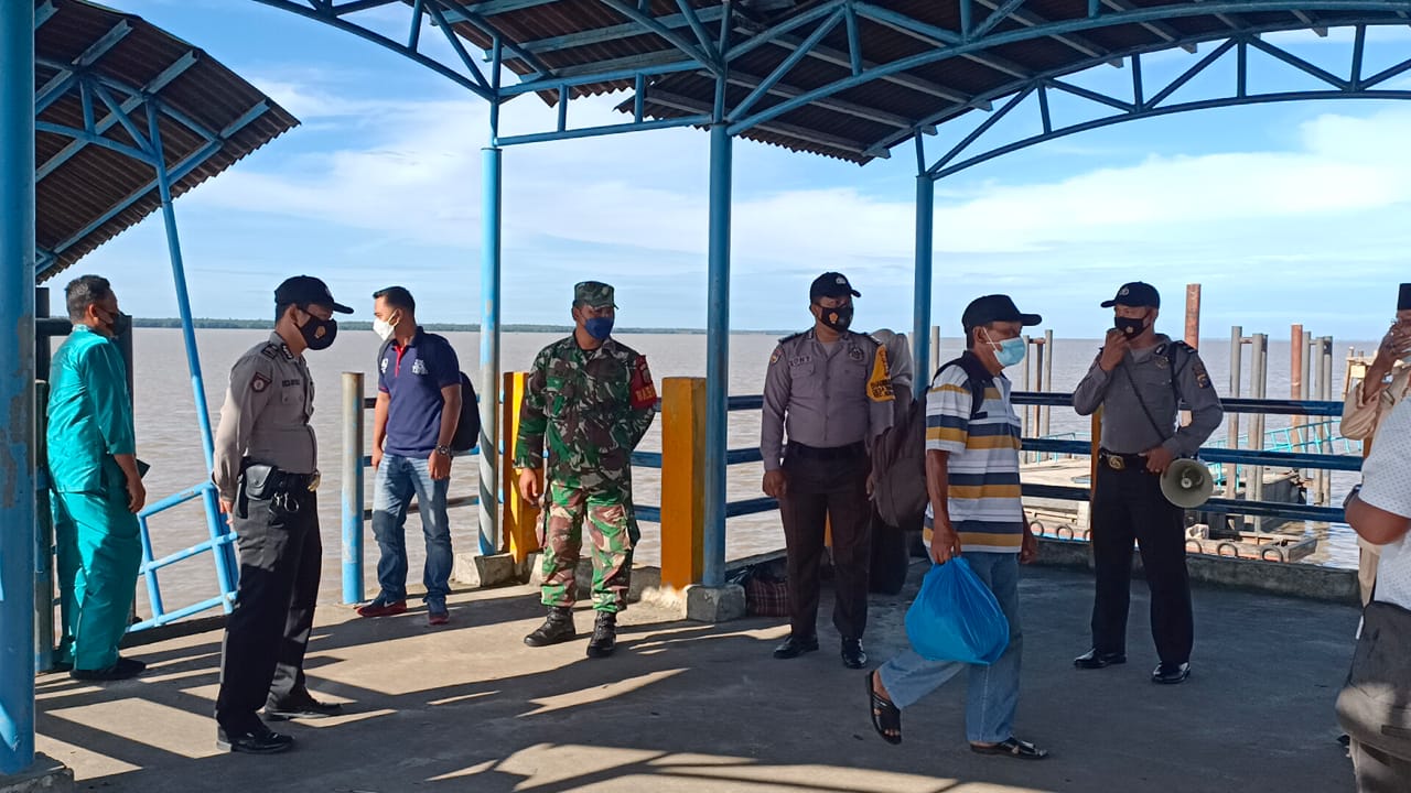 Cegah Penularan Covid-19 di Pelabuhan, Polsek Kuala Kampar Terapkan Pos PPKM