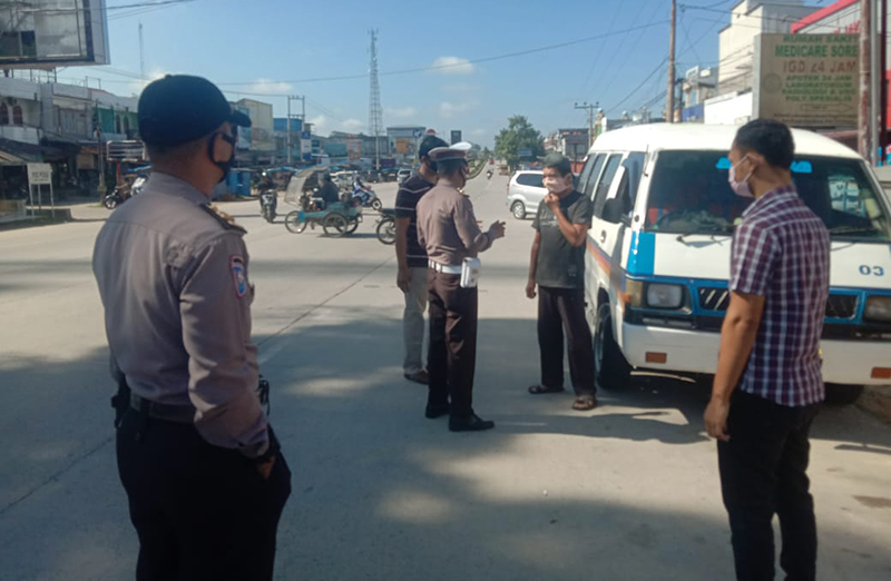 Polsek Pangkalan Kuras Gugah Kesadaran Masyarakat Soal Peniadaan Mudik dengan Penling