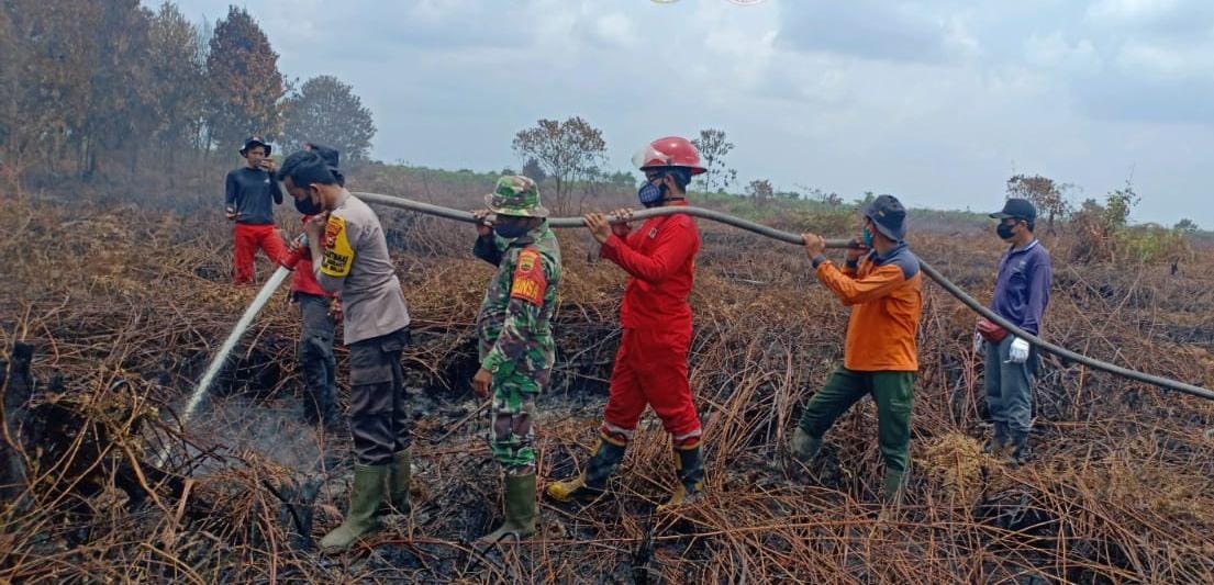 Polsek Teluk Meranti Lakukan Pendinginan  di Titik Hotspot Termonitor Aplikasi DLK