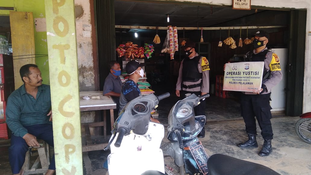 Polsek Ukui Imbau Pelaku Usaha Perketat Prokes Terhadap Pelanggan