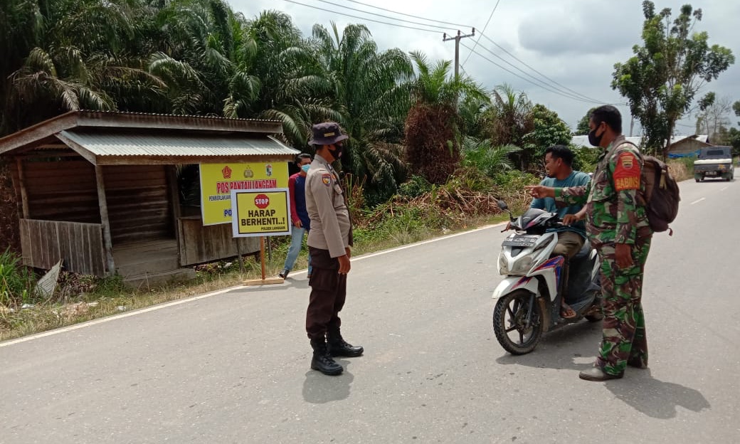 Kapolsek Langgam Rutin Pimpin Operasi Yustisi PPKM