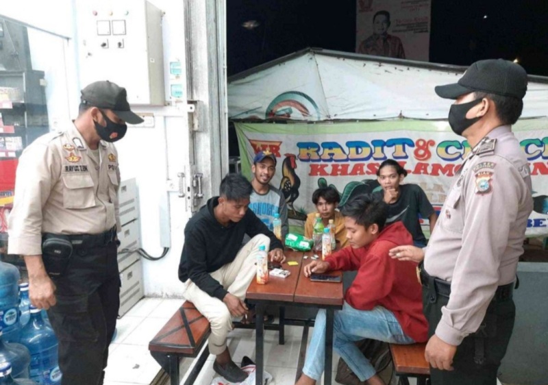 Tekan Penyebaran Covid-19, Polsek Bunut Lakukan Imbauan Penegasan kepada Masyarakat yang Tak Gunakan Masker 