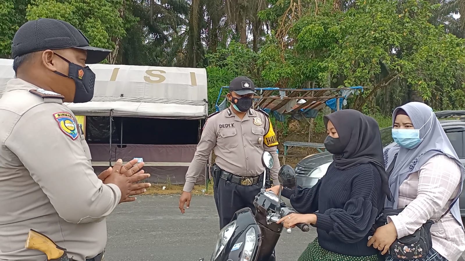 Lindungi Masyarakat dari Covid-19, Kapolsek Kerumutan Kerahkan Personel Lakukan Operasi Yustisi