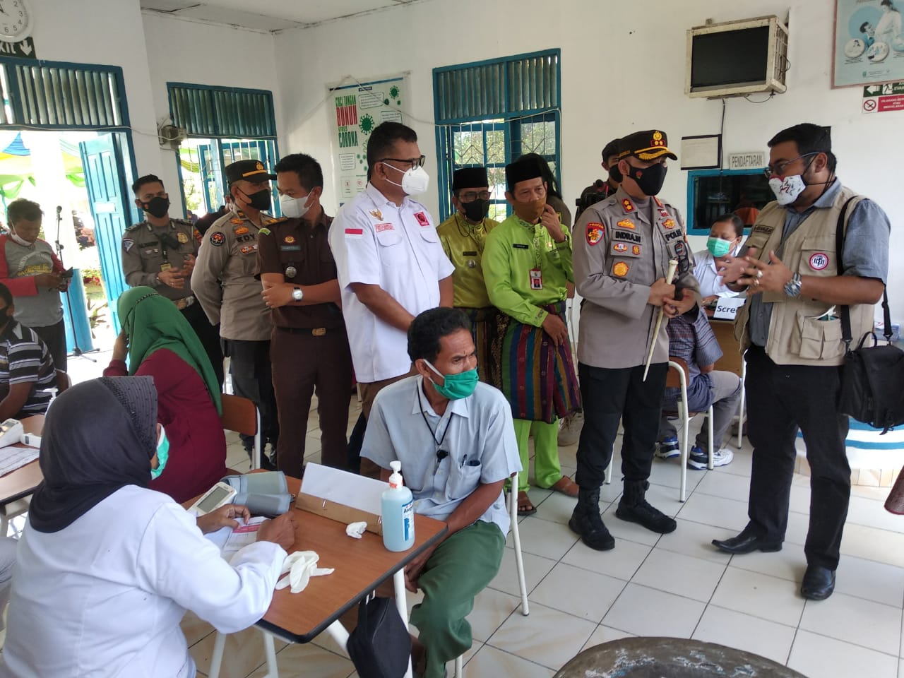 Polsek Bunut Dampingi Kapolres Pelalawan Hadiri Vaksinasi Massal Nasional di PT Serikat Putra