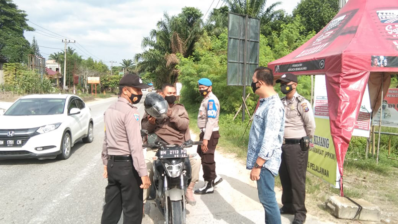 Sasar Pengendara yang Melintas, Polsek Bandar Sei Kijang Gelar Operasi Yustisi di Pos PPKM