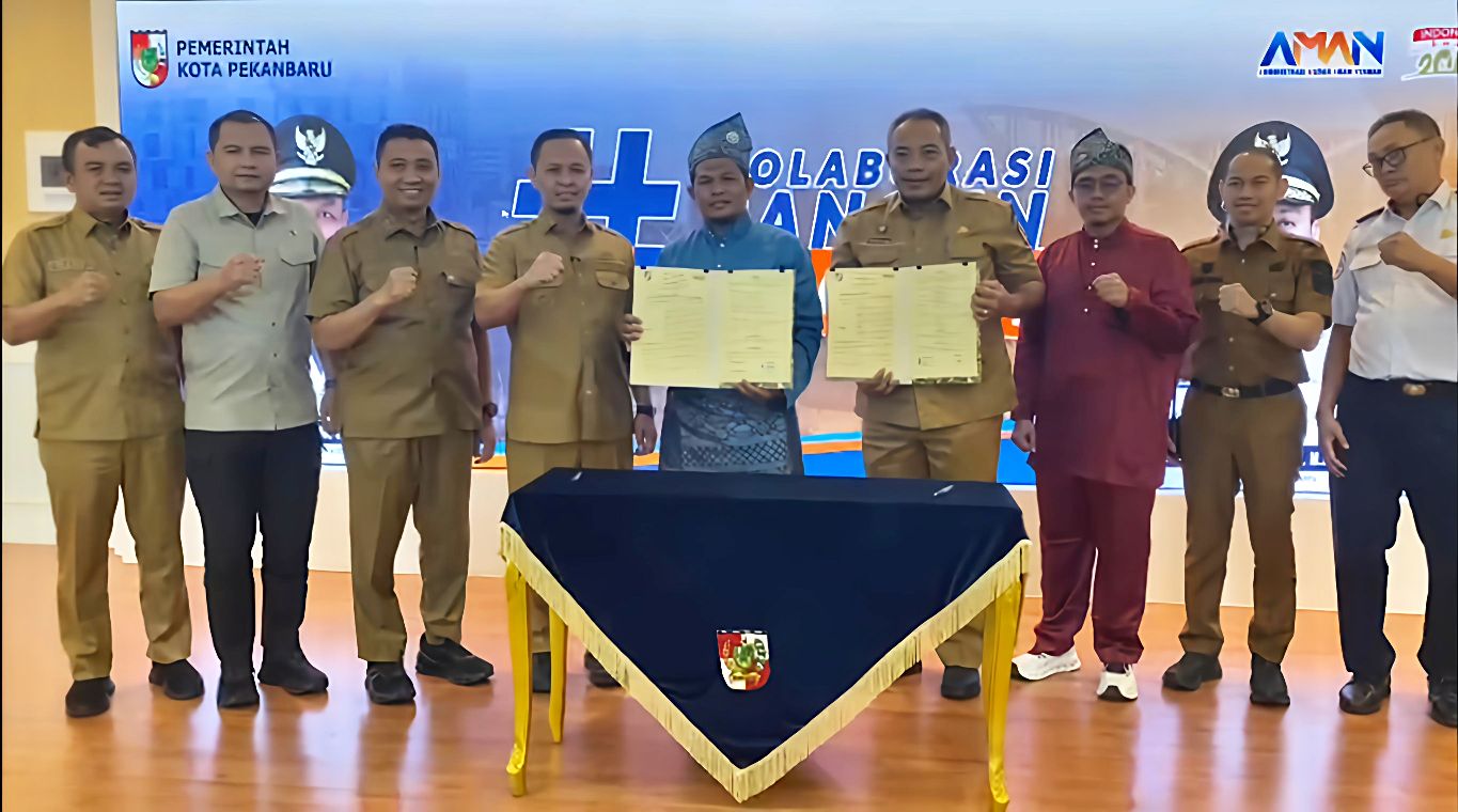 Jukir Tetap Ditampung, Pemko Pekanbaru dan Alfamart Tandatangani MoU Parkir Gratis