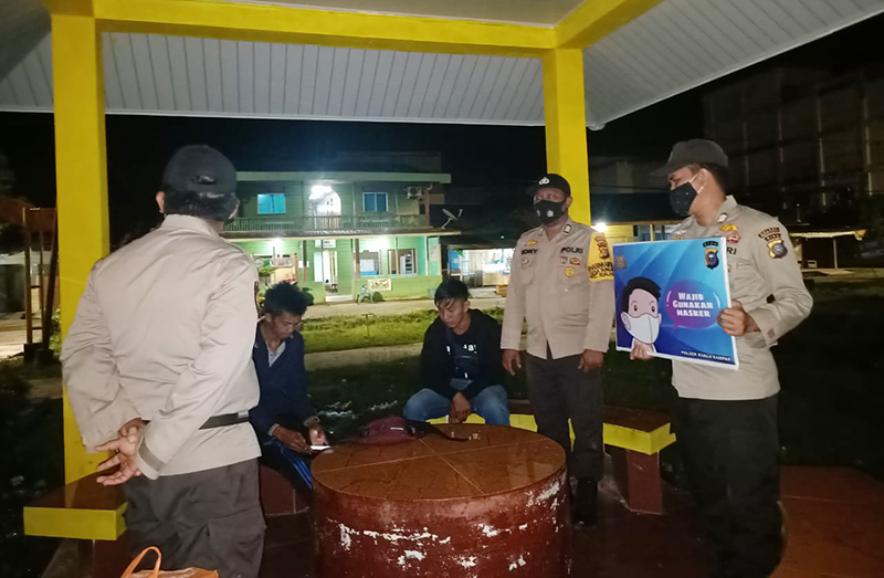 Cegah Covid-19, Polsek Kuala Kampar Imbau Masyarakat Selalu Patuhi Prokes