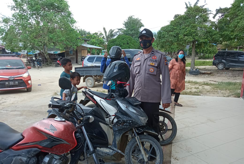 Polsek Langgam Gelar Patroli C3 dan Sosialisasi Prokes di Lingkungan Perbankan