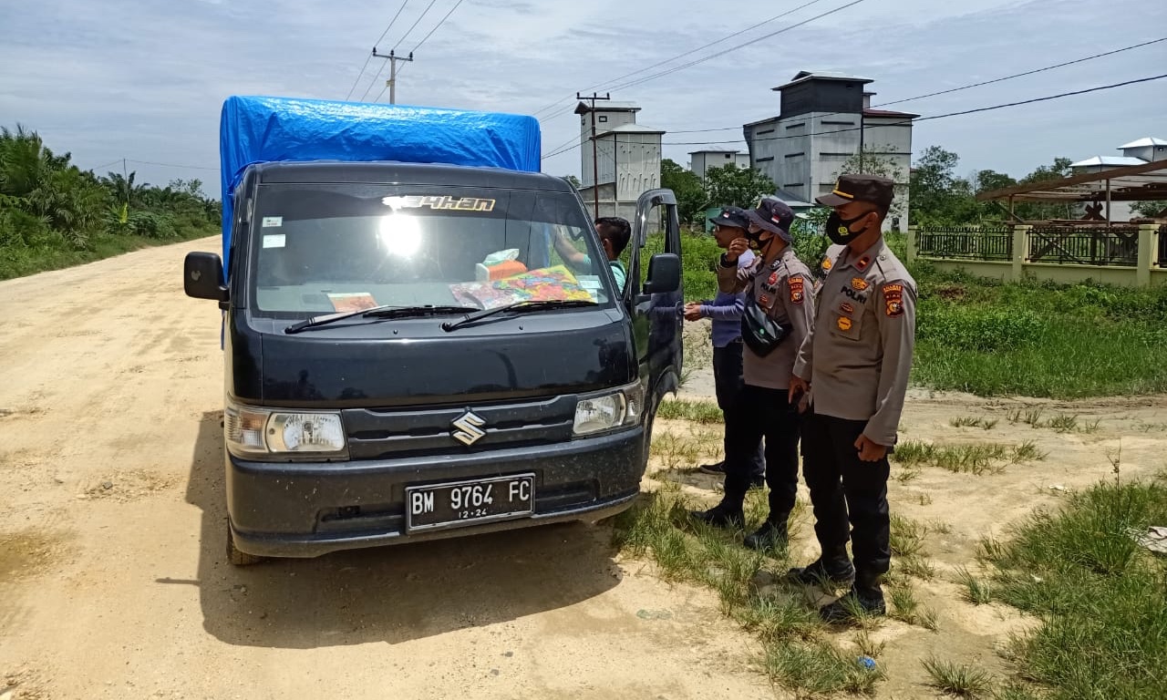 Polsek Teluk Meranti Kembali Razia Masker di Seputaran Lintas Bono Pelalawan