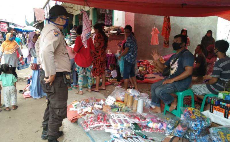 Polsek Langgam Gelar Patroli C3 dan Sosialisasi Antisipasi Covid-19 di Pasar Segati