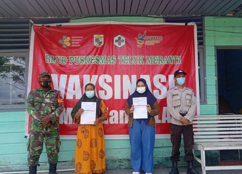 Gerai Vaksinasi di Puskesmas Teluk Meranti Dikawal Ketat Polri dan TNI