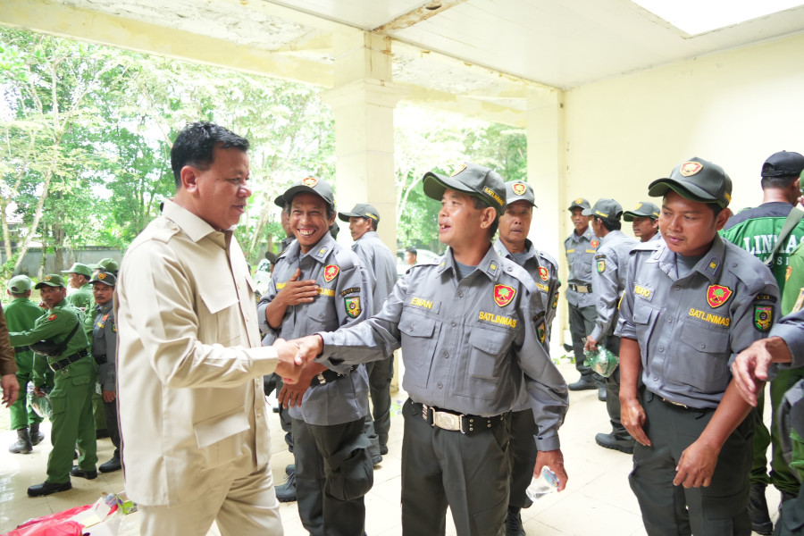 Bersama Ribuan Anggota LINMAS;  Bupati Suhardiman  Kuansing Siap Sukseskan Pemilu