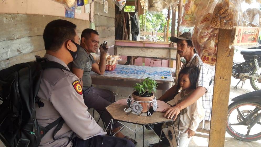 Polsubsektor Pelalawan Sambang Warga Desa Delik Guna Sosialisasi Cegah Covid-19