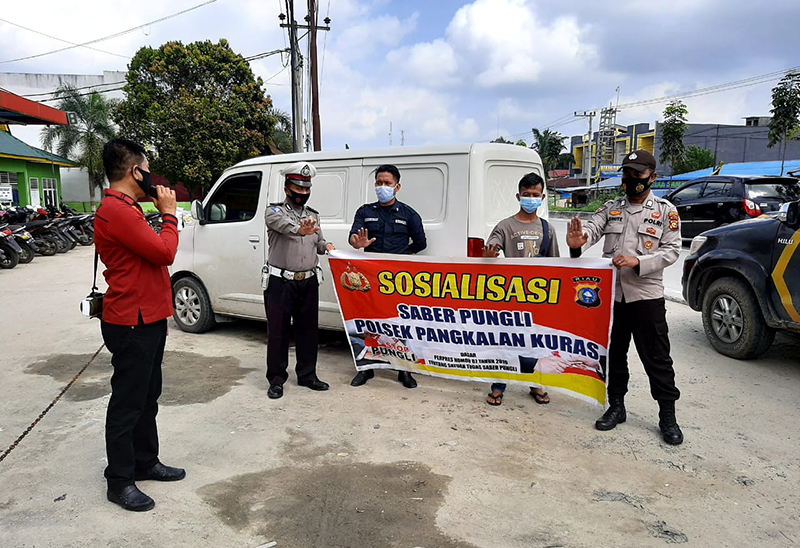 Polsek Pangkalan Kuras Sosialisasikan Saber Pungli kepada Sopir Mobil Box