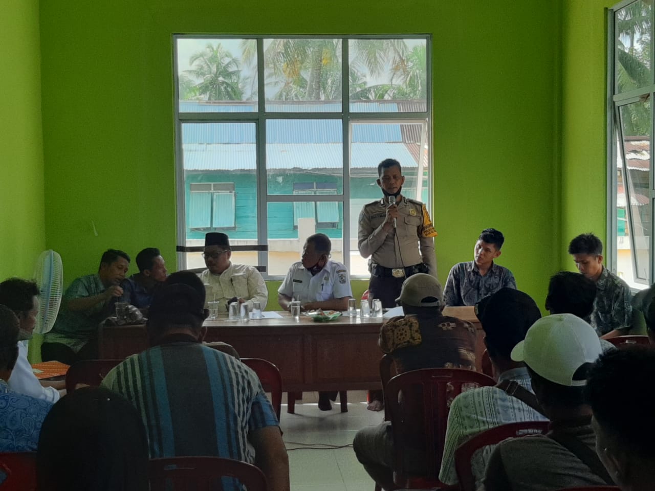 Polsek Kuala Kampar Hadiri Rapat RKPDES, Sekaligus Ajak Masyarakat Ikuti Vaksinasi