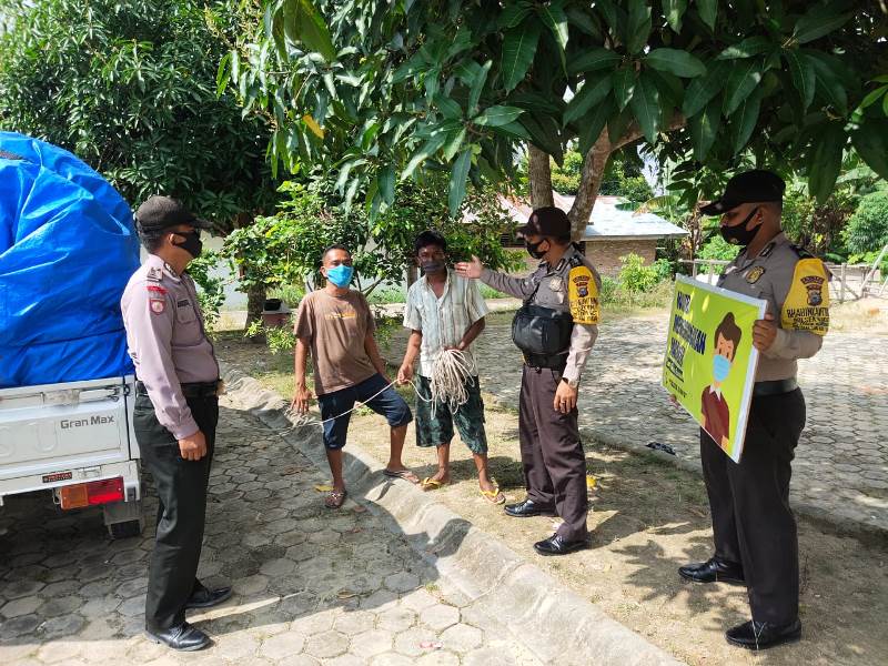 Polsek Bunut Ajak Masyarakat Biasakan Beraktivitas dengan Protokol Kesehatan