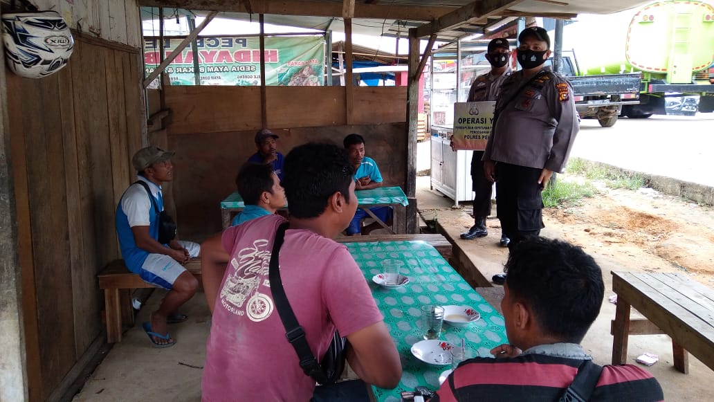 Cegah Covid-19, Polsek Ukui Minta Masyarakat Kurangi Mobilitas di Malam Hari