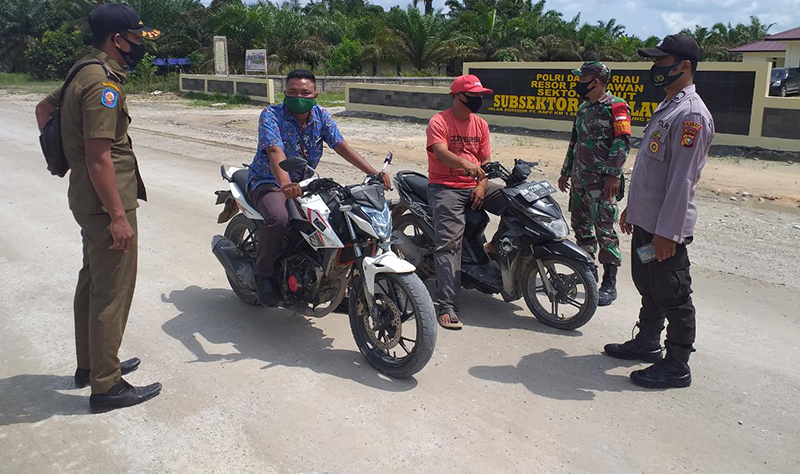 Pelaksanaan 100 Hari Program Prioritas Kapolri, Polsubsektor Pelalawan Gelar Operasi Yustisi