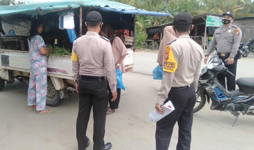 Tertibkan Prokes di Wilkum, Polsubsektor Pelalawan Laksanakan Yustisi