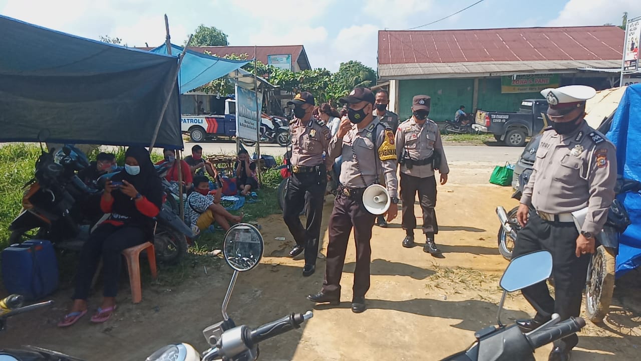 Gencar Pendisiplinan Prokes, Polsek Pangkalan Kuras Minta Masyarakat Pasar Patuhi 5M