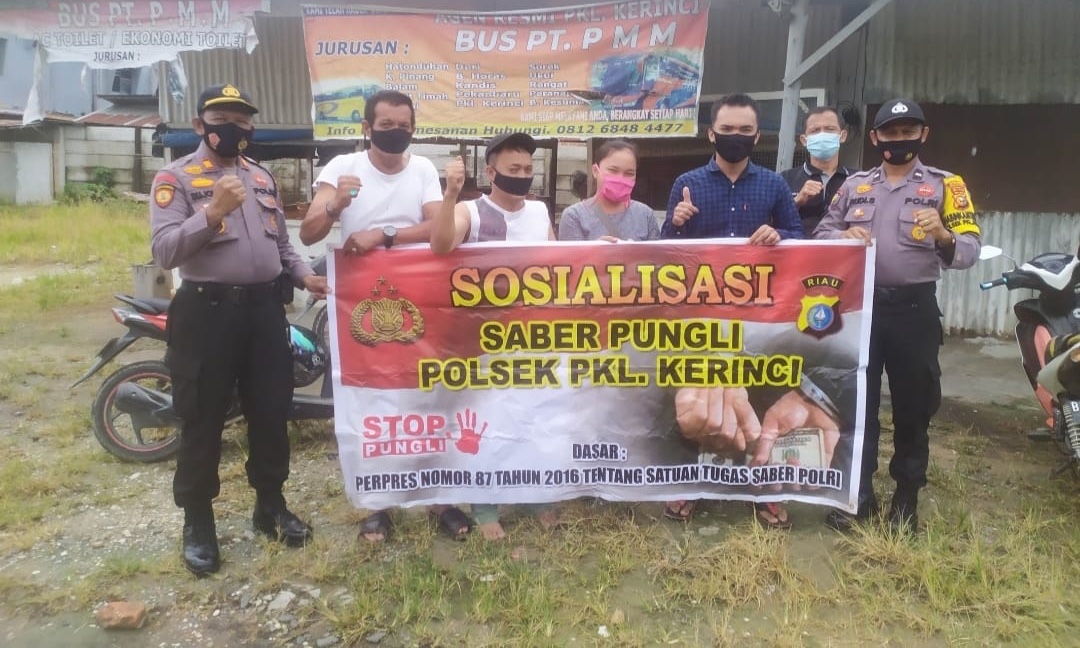 Polsek Pangkalan Kerinci Laksanakan Sosialisasi Saber Pungli kepada Petugas Parkir