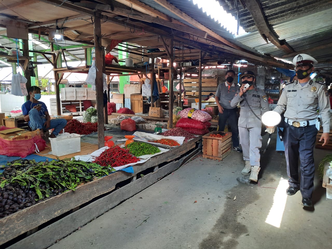 Cegah Kerumunan di Pasar, Polsek Pangkalan Kuras Gelar Operasi Yustisi