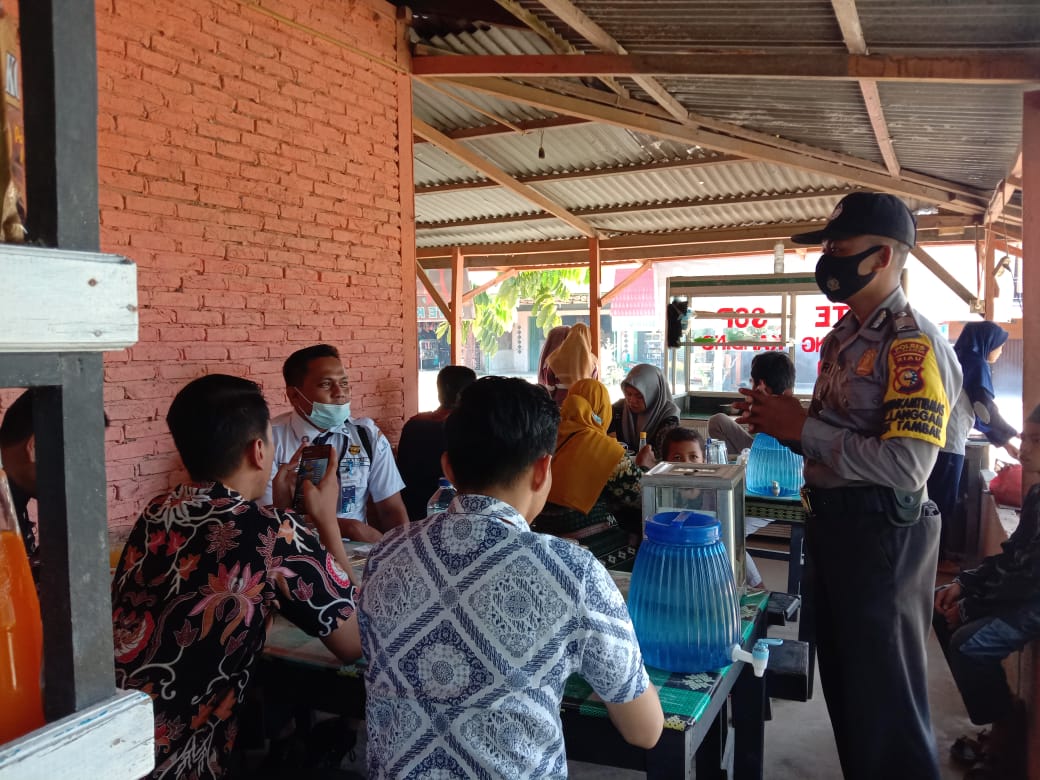 Polsek Langgam Gelar Operasi Yustisi Prokes dengan Sasaran Pusat Keramaian