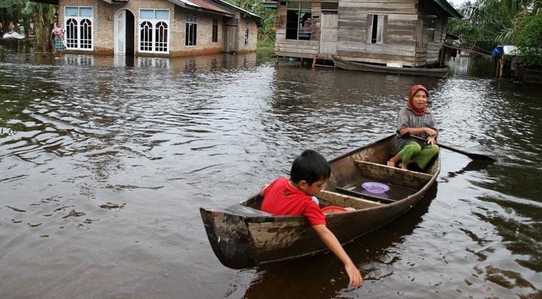 Musim Hujan dan Berpotensi Banjir, Masyarakat Riau yang Tinggal di Bantaran Sungai Harus Waspada!