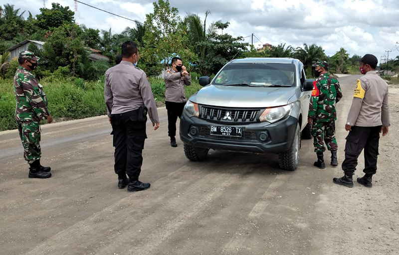 Lindungi Warga dari Covid-19, Polsubsektor Pelalawan Gelar Operasi Yustisi Protokol Kesehatan