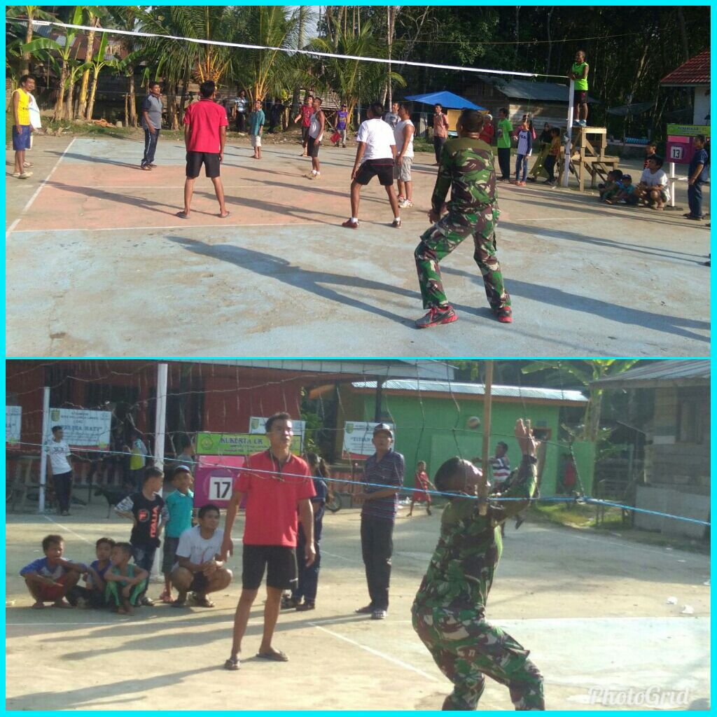 Untuk Meningkatkan Kebugaran Tubuh,Serda Sadali Berolahraga Bola Voly Bersama Masyarakat Desa Pulau Kijang.