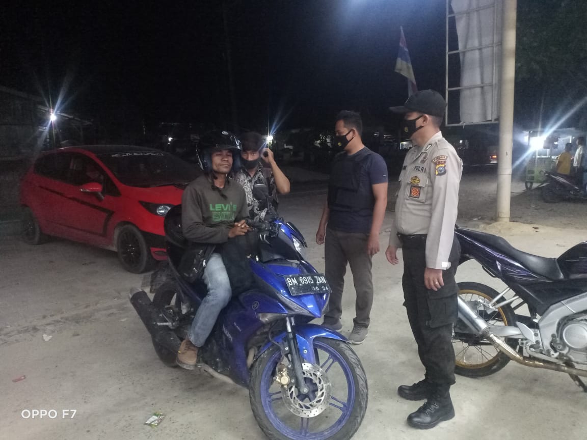 Lindungi Wilkum dari Paparan Covid-19, Polsek Bandar Sei Kijang Gelar Sosialisasi Prokes