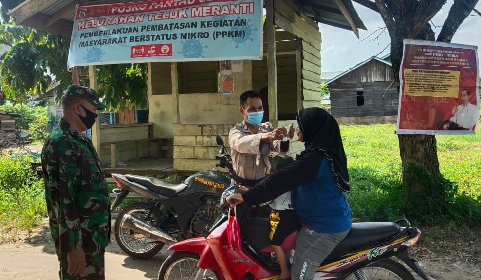 Polsek Teluk Meranti Pelalawan Kembali Imbau Masyarakat Patuhi Prokes Melalui Pos PPKM
