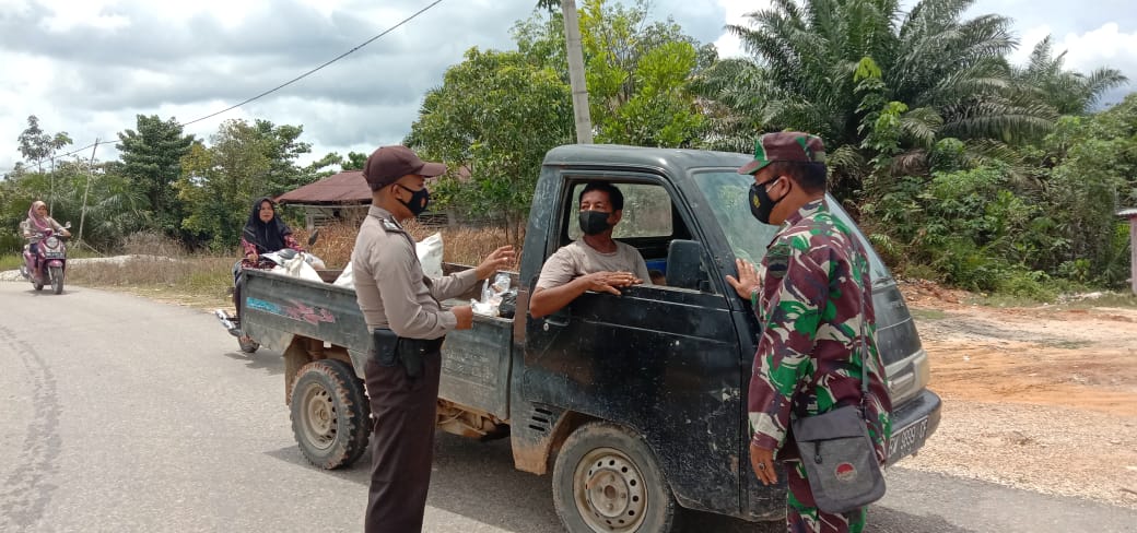 Berikan Rasa Aman, Polsek Langgam Rutin Patroli dan Imbau Disiplin Prokes