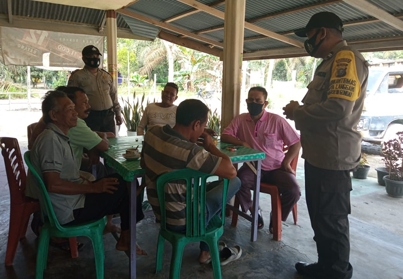 Polsek Langgam Gelar Patroli untuk Cegah Kriminal dan Tekan Penyebaran Covid-19