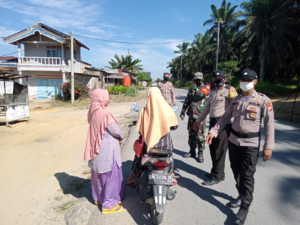 Polsek Kerumutan Kembali Sosialisasikan Prokes Kepada Pengendara